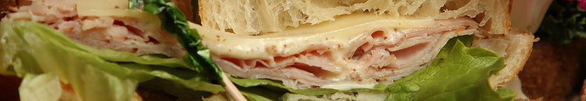 Eating Sandwich at Munch A Lunch restaurant in Tempe, AZ.